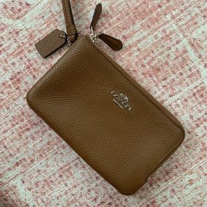 COACH brown wristlet.